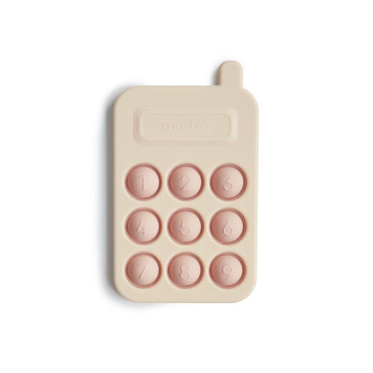 Mushie press toy cellphone Blush